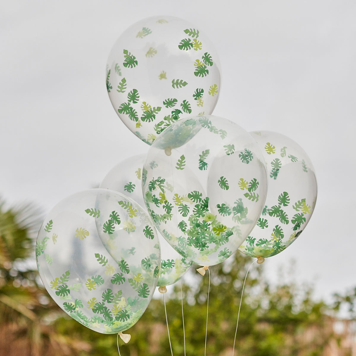 Ballon de baudruche transparent - Confettis feuilles de palmier